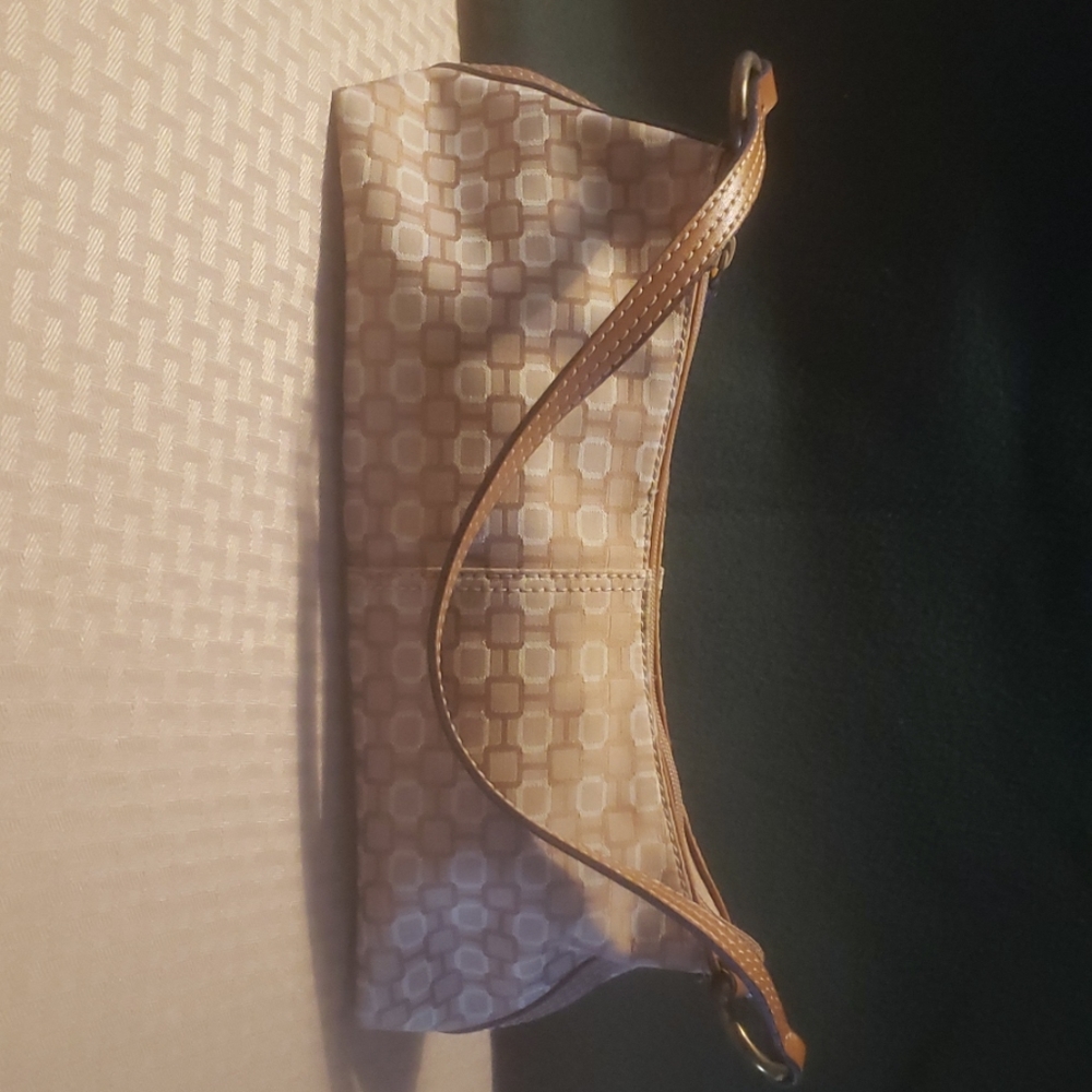 Clutch with strap
